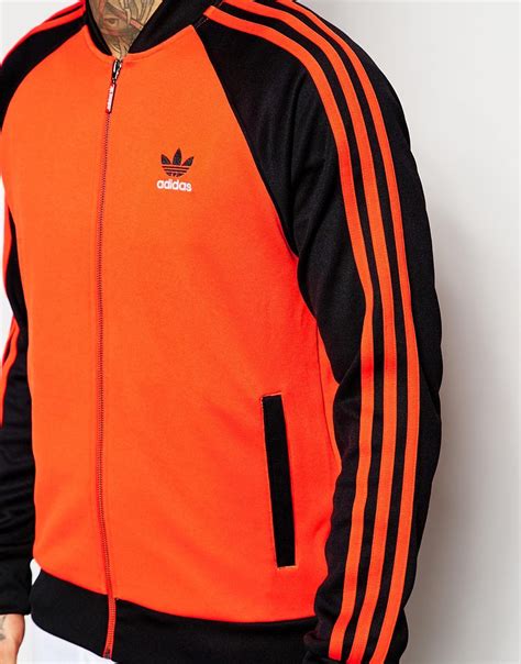 adidas originals jacket blue orange